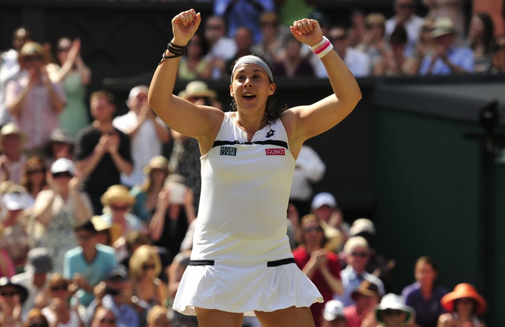 Marion Bartoli comemora título de Wimbledon em 2013 (Glyn Kirk/AFP) 